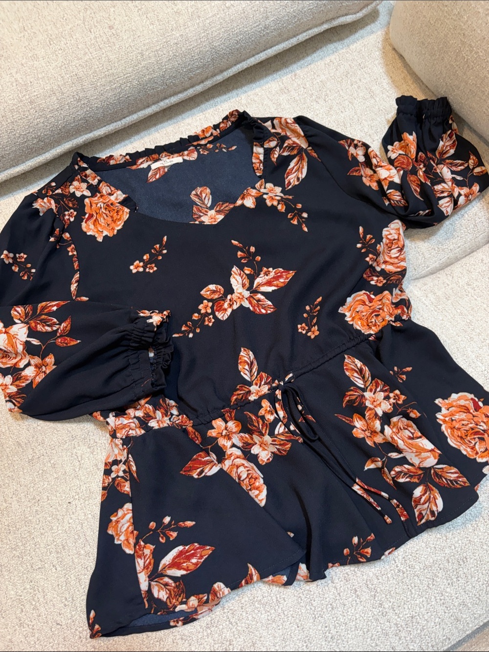 Maurices Black Floral Drawstring Peplum Blouse with Orange Rose Motif